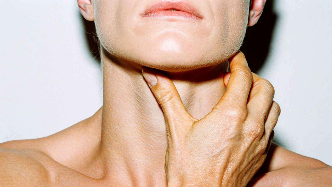 Hands gripping the neck — the pain that doesn't wait