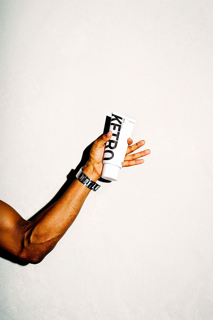 Hand holding Ketro Rx Pain Gel
