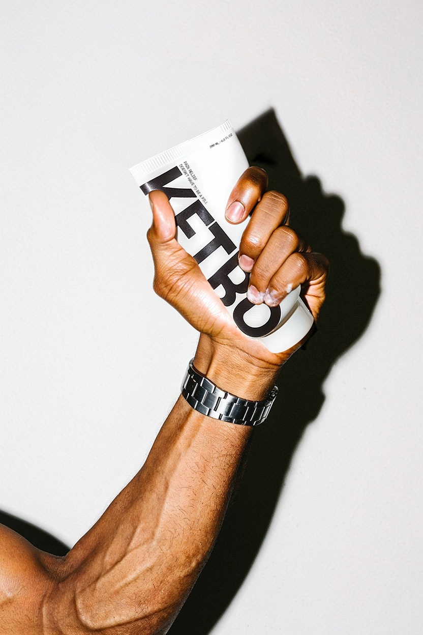 Athlete's hand with Ketro Rx Pain Gel
